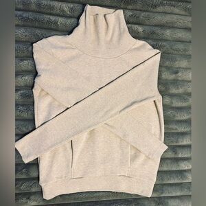 Alo turtleneck is perfect for before and after workouts or pairing with jeans.